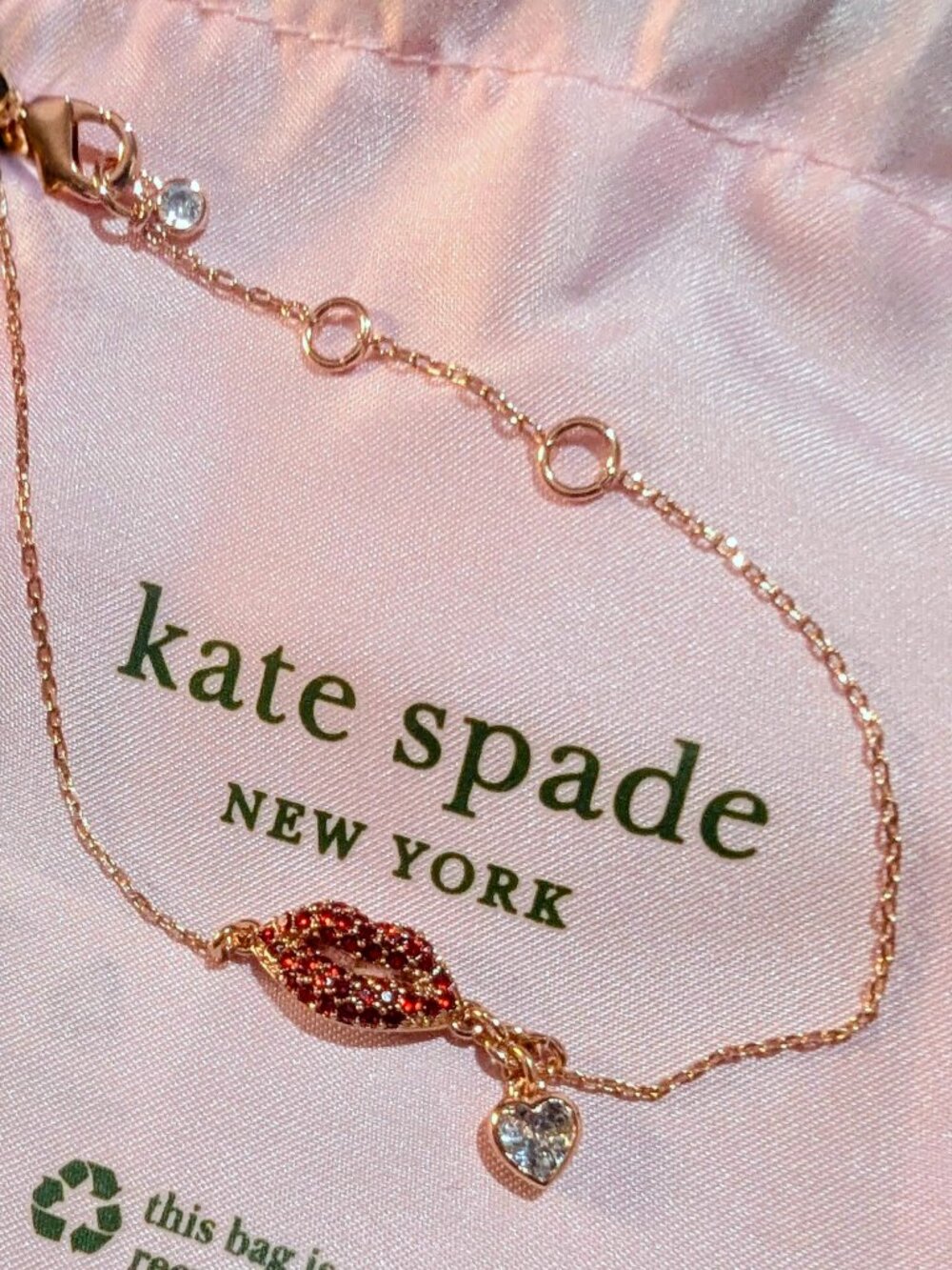 kate spade New York Rose Gold Lip & Heart Bracelet with Red Crystal Accents